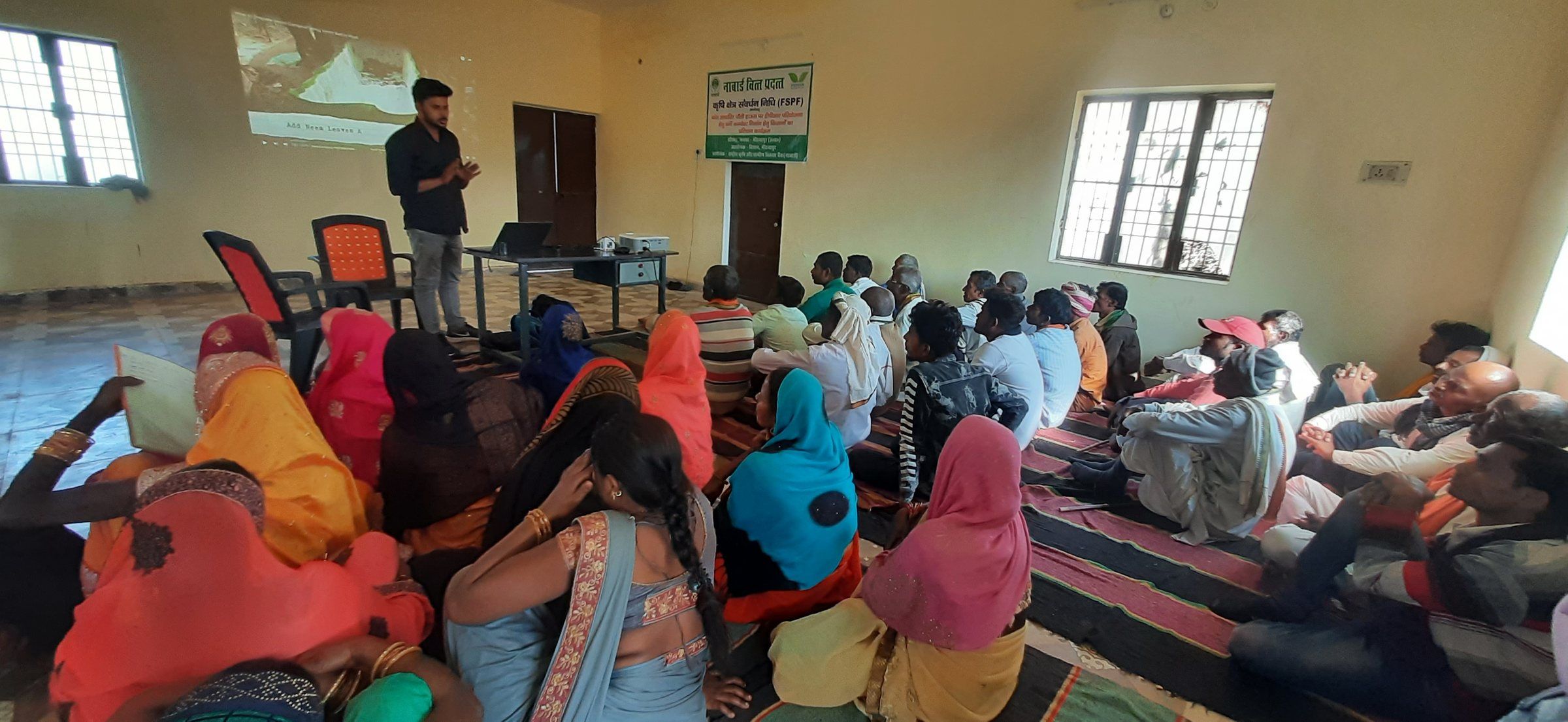 Women attending a training session in a hall